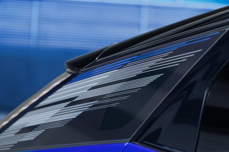 Close-up of the Modern Pattern on the 2026 OPTIQ-V Rear Quarter Glass | Coast Cadillac in Port Richey FL